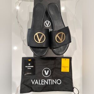Valentino by Mario Valentino Leather Flat Sandals in black. Lightly used!